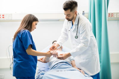 nurse and doctor evaluating patient