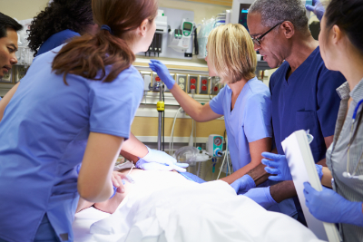 patient on exam table in emergency room