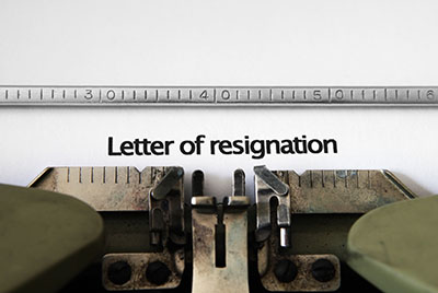 photo of typewriter with the words letter of resignation