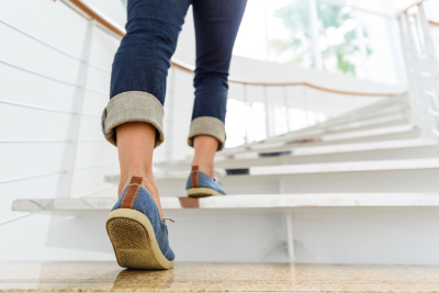 woman walking up stairs