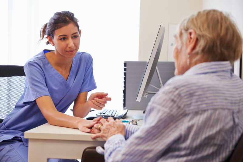 photo of nurse assessing patient